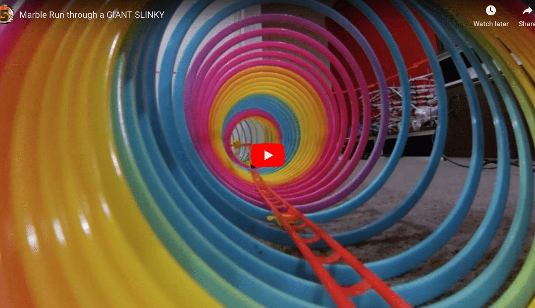 Marble Run Through A Giant Slinky